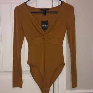 Long sleeve knit bodysuit. Size S